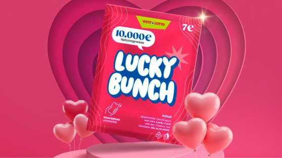 Rubbel-Quiz Lucky Bunch schwebt über pinker Treppe - umgeben von pinken Herz-Luftballons